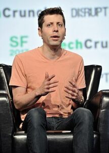 Man speaking at a conference.