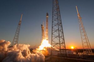 Rocket launching at sunset.