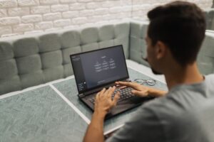 Person using ChatGPT on a laptop
