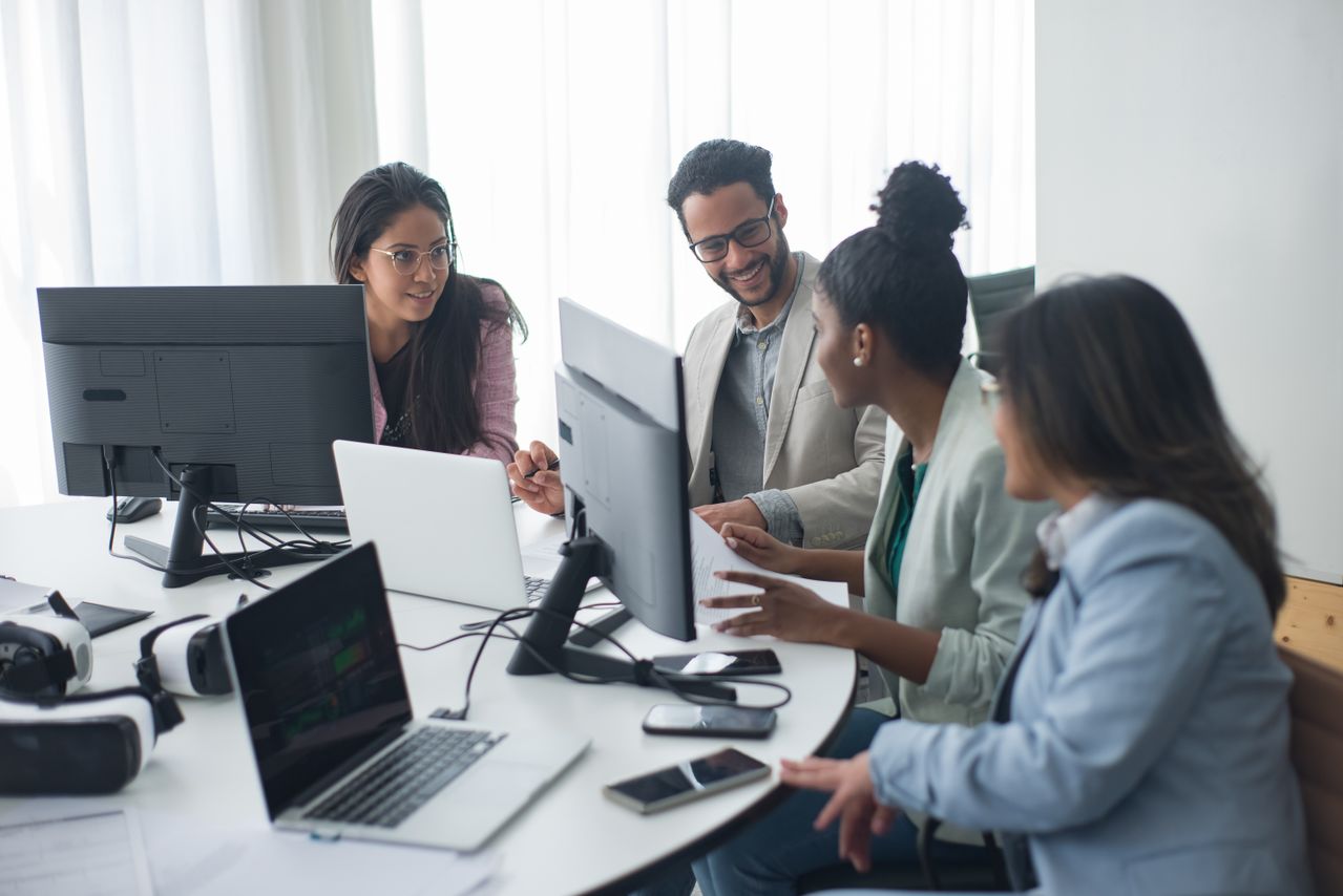 Professionals collaborating with AI