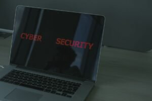 Cybersecurity warning on a laptop