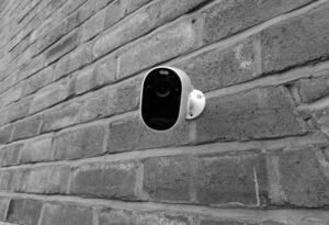 Surveillance camera on a wall