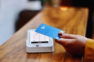 Contactless card tapped on a payment terminal