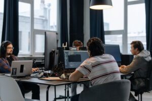 Team working with AI technology in an office