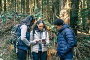 Hikers comparing ChatGPT and Gemini answers before deciding whether to trust the AI's advice