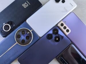 Multiple smartphones showing different camera designs, representing Snapdragon 8 Elite Gen 6 camera upgrades